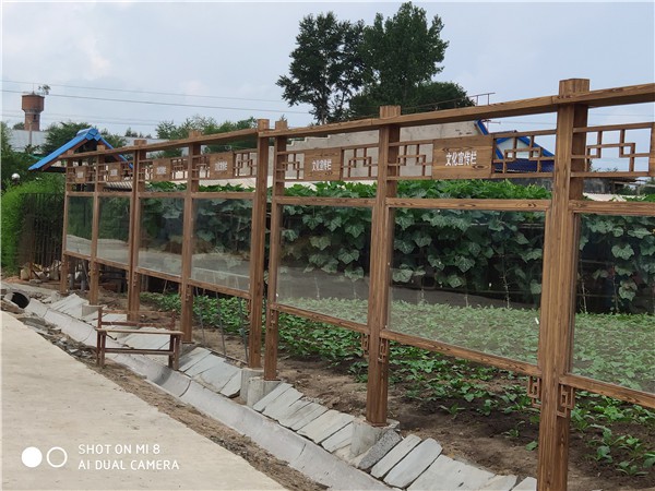 吉林鄉(xiāng)村鋼構(gòu)指示牌欄桿木紋漆施工